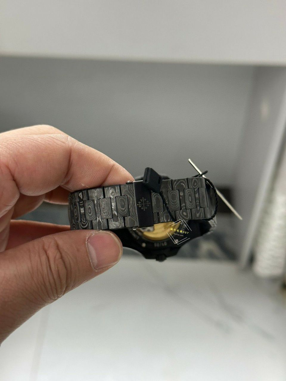  Video analysis PATEK PHILIPPE   PATEK PHILIPPE  carbon fiber DIW  Nautilus 5711  / BD389